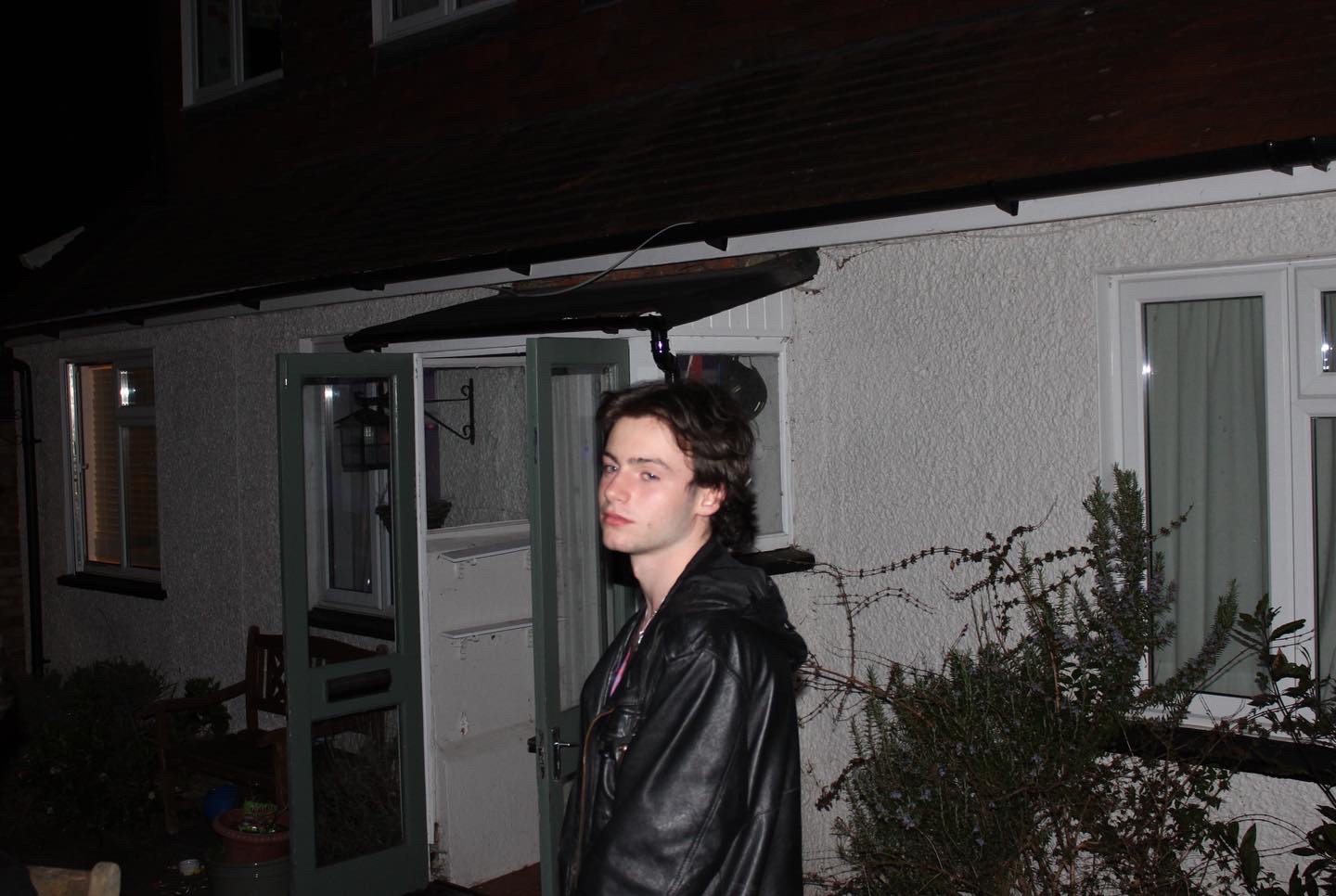 Boy in leather jacket